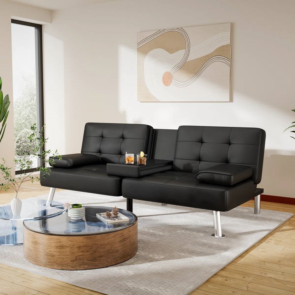 Modern Black Faux Leather Futon Sofa Bed with Armrest and Metal Legs by FastFurnishings